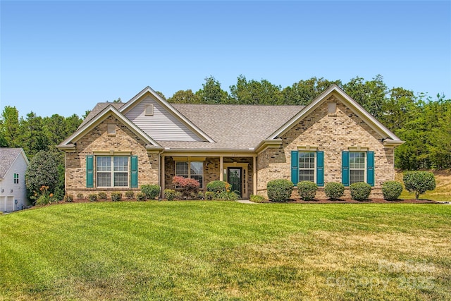 5237 Afterglow Ave, Concord, NC 28025 - ranch-style house with brick siding, a front yard, and a shingled roof