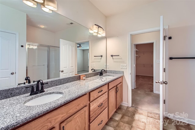 5237 Afterglow Ave, Concord, NC 28025 - full bath with a ceiling fan, double vanity, a shower stall, and a spacious closet