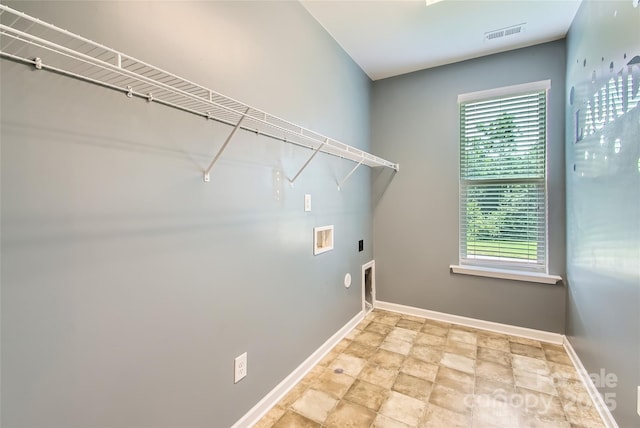 5237 Afterglow Ave, Concord, NC 28025 - washroom with washer hookup, stone finish flooring, and electric dryer hookup