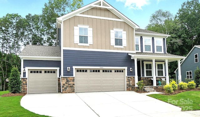 9945 Cask Way, Huntersville, NC 28078 - craftsman-style house featuring concrete driveway, stone siding, covered porch, and board and batten siding