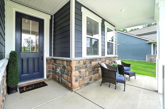 9945 Cask Way, Huntersville, NC 28078 - view of exterior entry with covered porch and stone siding