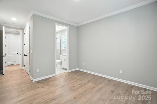9945 Cask Way, Huntersville, NC 28078 - unfurnished bedroom featuring light wood-style flooring, crown molding, ensuite bath, and recessed lighting