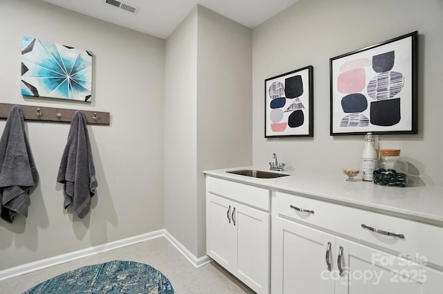 9945 Cask Way, Huntersville, NC 28078 - bathroom with a sink and baseboards