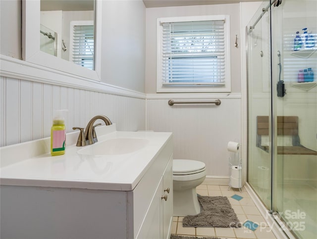 143 W College St, Stanley, NC 28164 - full bathroom featuring tile patterned floors, vanity, plenty of natural light, a stall shower, and wainscoting