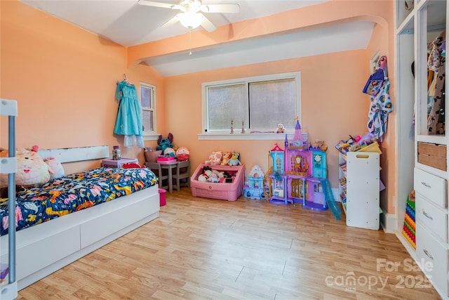 143 W College St, Stanley, NC 28164 - bedroom with lofted ceiling, wood finished floors, ceiling fan, and arched walkways