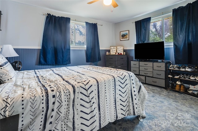 143 W College St, Stanley, NC 28164 - carpeted bedroom featuring wainscoting and ceiling fan