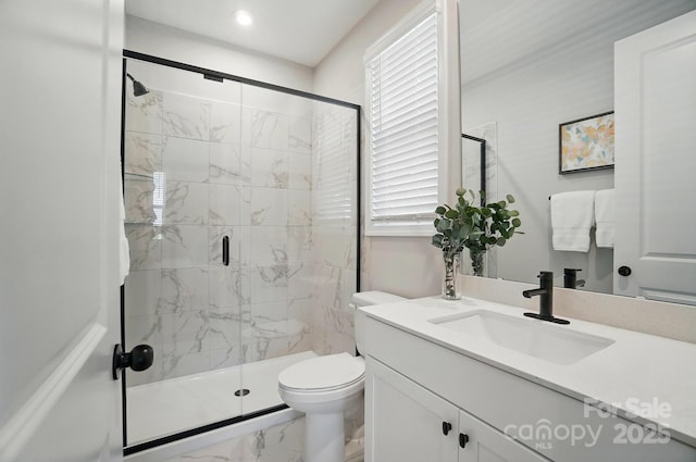 9843 Quercus Ln, Huntersville, NC 28078 - full bathroom featuring marble look tiles, vanity, a shower stall, and healthy amount of natural light
