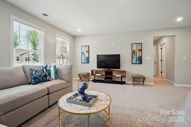 9843 Quercus Ln, Huntersville, NC 28078 - carpeted living area featuring baseboards and recessed lighting