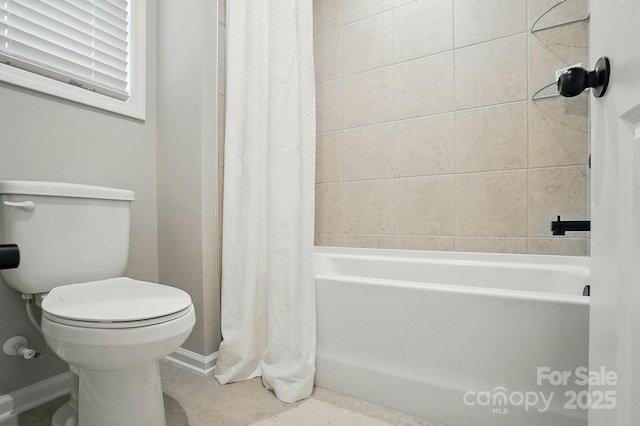 9843 Quercus Ln, Huntersville, NC 28078 - bathroom featuring shower / bath combo with shower curtain and tile patterned floors
