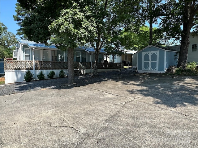 104 Pine St Unit 201, New London, NC 28127 - view of front of house with a shed