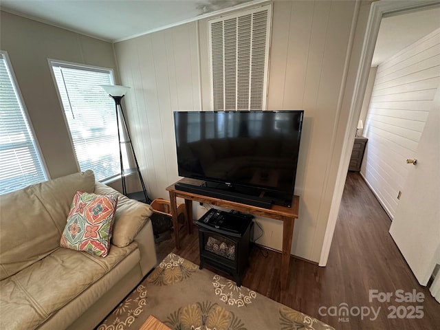 104 Pine St Unit 201, New London, NC 28127 - living room featuring wood finished floors, wood walls, and ornamental molding