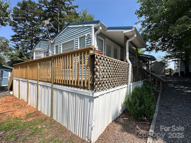 104 Pine St Unit 201, New London, NC 28127 - back of house with a wooden deck