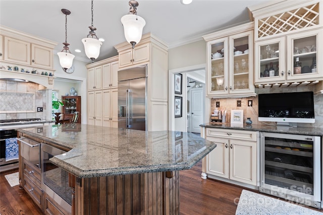 19245 Stableford Ln, Cornelius, NC 28031 - kitchen with built in appliances, beverage cooler, cream cabinetry, decorative backsplash, and ornamental molding