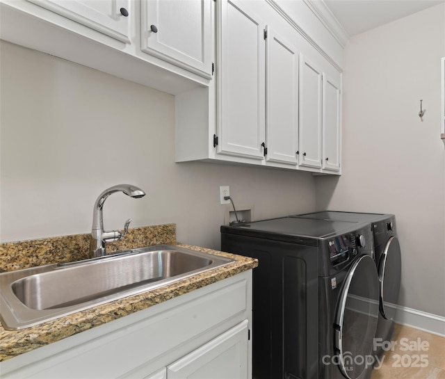 19245 Stableford Ln, Cornelius, NC 28031 - laundry room featuring washer and dryer and cabinet space