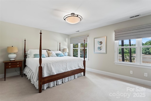 19245 Stableford Ln, Cornelius, NC 28031 - bedroom with light carpet and baseboards