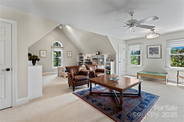 19245 Stableford Ln, Cornelius, NC 28031 - carpeted living area featuring healthy amount of natural light, ceiling fan, and vaulted ceiling