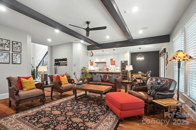 5005 Craftsman Ridge Dr, Matthews, NC 28104 - living area with wood finished floors, beamed ceiling, ceiling fan, healthy amount of natural light, and recessed lighting