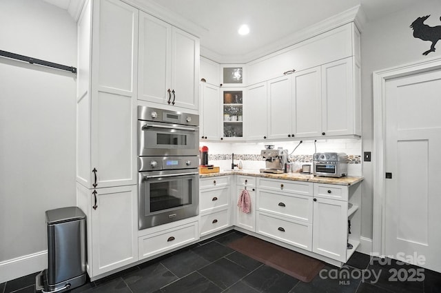 5005 Craftsman Ridge Dr, Matthews, NC 28104 - kitchen featuring double oven, white cabinets, and recessed lighting