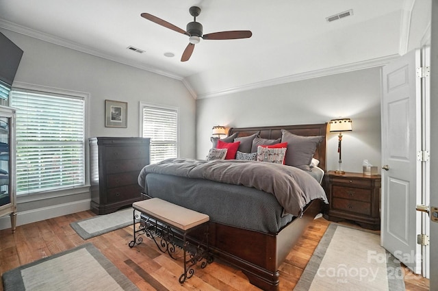 5005 Craftsman Ridge Dr, Matthews, NC 28104 - bedroom with crown molding, lofted ceiling, wood finished floors, and ceiling fan