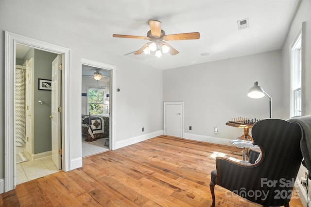 5005 Craftsman Ridge Dr, Matthews, NC 28104 - sitting room featuring ceiling fan and light wood-type flooring