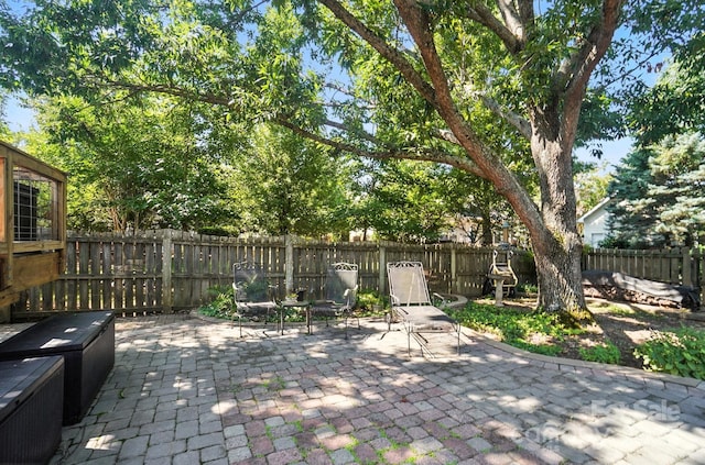 5005 Craftsman Ridge Dr, Matthews, NC 28104 - fenced backyard with a patio