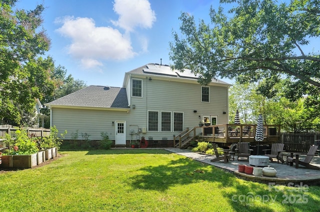 5005 Craftsman Ridge Dr, Matthews, NC 28104 - rear view of house with a patio area, a wooden deck, a vegetable garden, roof with shingles, and crawl space