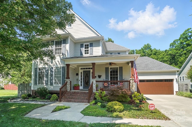 5005 Craftsman Ridge Dr, Matthews, NC 28104 - view of front of house with a porch, a garage, driveway, ceiling fan, and a shingled roof