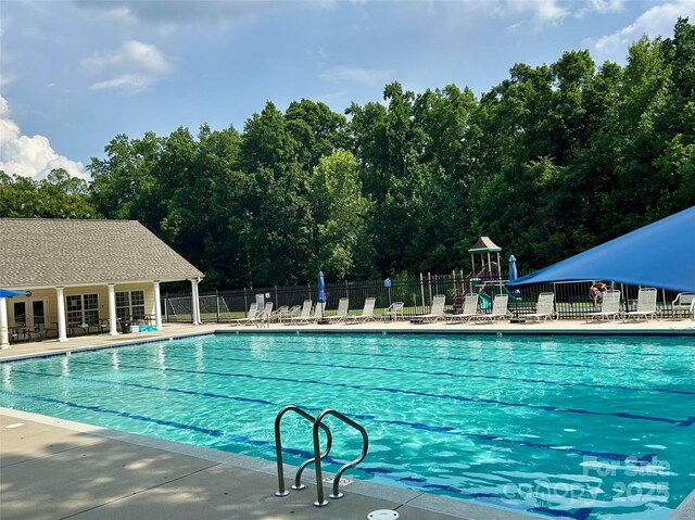 5005 Craftsman Ridge Dr, Matthews, NC 28104 - community pool with a patio