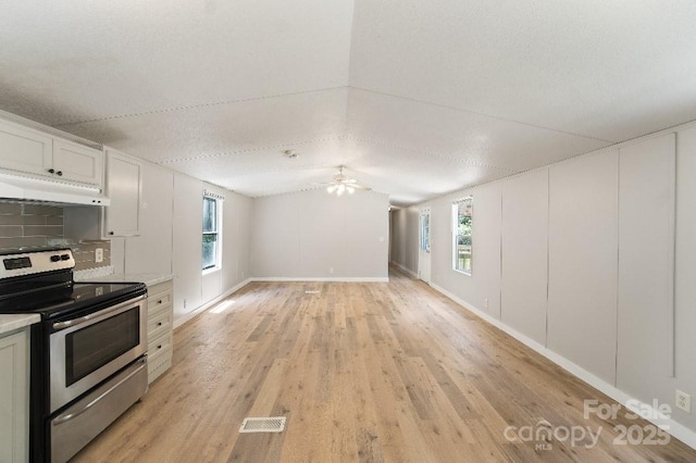 1354 Springwood Ln, Rock Hill, SC 29730 - unfurnished living room featuring a ceiling fan and light wood finished floors