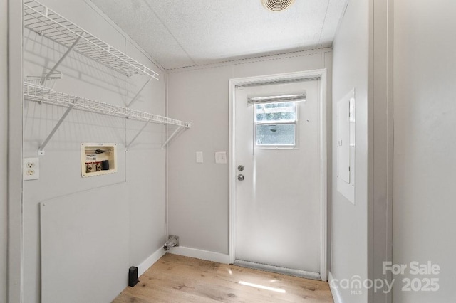 1354 Springwood Ln, Rock Hill, SC 29730 - laundry room with hookup for a washing machine and light wood-type flooring