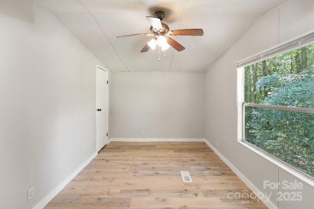 1354 Springwood Ln, Rock Hill, SC 29730 - empty room featuring ceiling fan, light wood-type flooring, and vaulted ceiling
