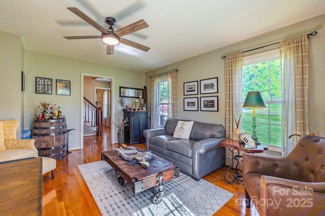 302 Redwood Pl, Lenoir, NC 28645 - living area with ceiling fan, stairs, and wood finished floors