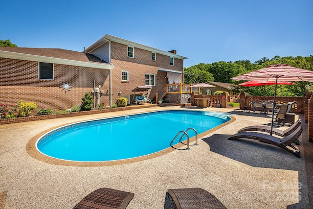 302 Redwood Pl, Lenoir, NC 28645 - view of swimming pool with a wooden deck and a patio