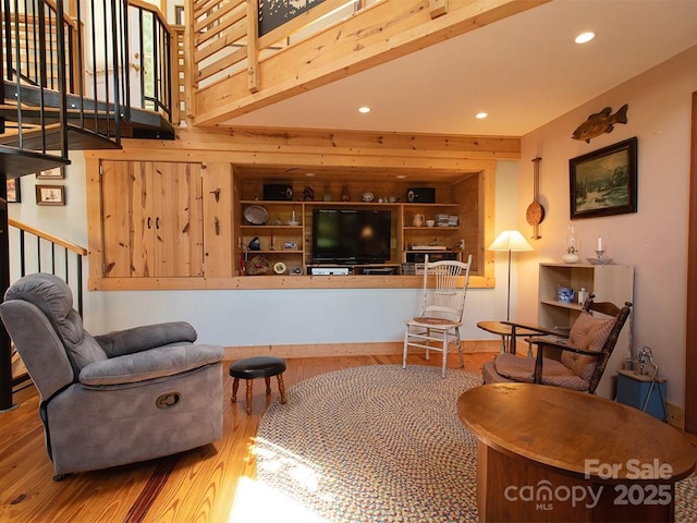 1090 Woolyshot Branch Rd, Hot Springs, NC 28743 - living room featuring wood finished floors, stairway, and recessed lighting