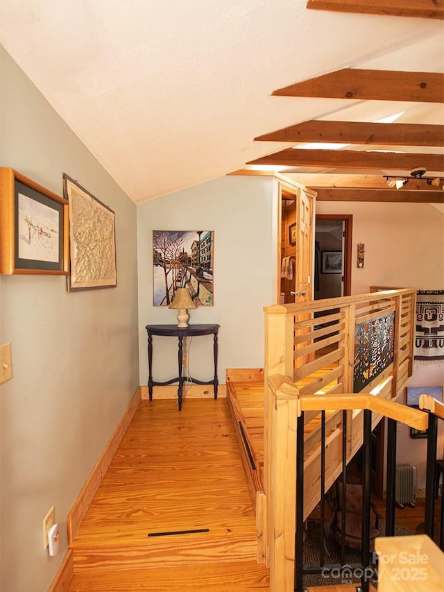 1090 Woolyshot Branch Rd, Hot Springs, NC 28743 - corridor featuring an upstairs landing, lofted ceiling, and light wood-type flooring