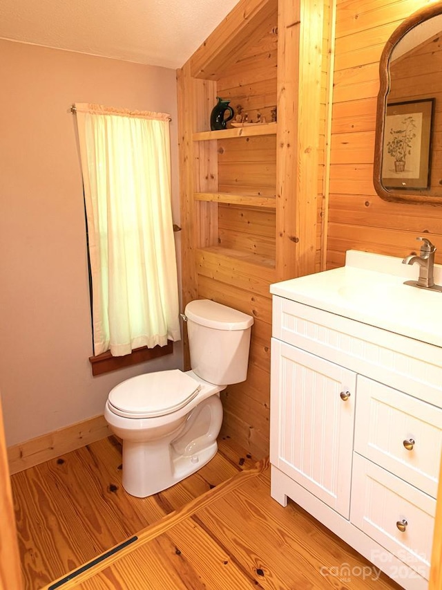 1090 Woolyshot Branch Rd, Hot Springs, NC 28743 - half bath featuring vanity, wooden walls, and wood finished floors