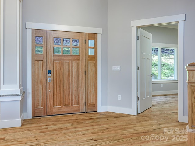 62 Sharp Rd W, Black Mountain, NC 28711 - entrance foyer with baseboards and light wood-style flooring