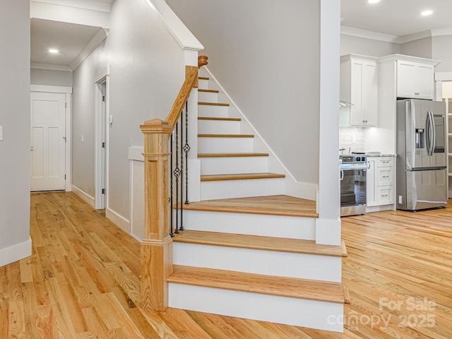 62 Sharp Rd W, Black Mountain, NC 28711 - staircase with ornamental molding, wood finished floors, and recessed lighting