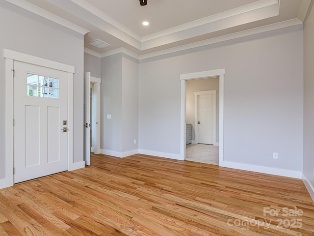 62 Sharp Rd W, Black Mountain, NC 28711 - foyer entrance featuring ornamental molding, light wood-type flooring, and a tray ceiling