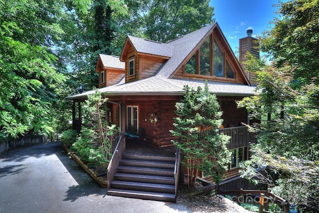 178 Anglers Way, Lake Lure, NC 28746 - cabin with covered porch, a shingled roof, and a chimney