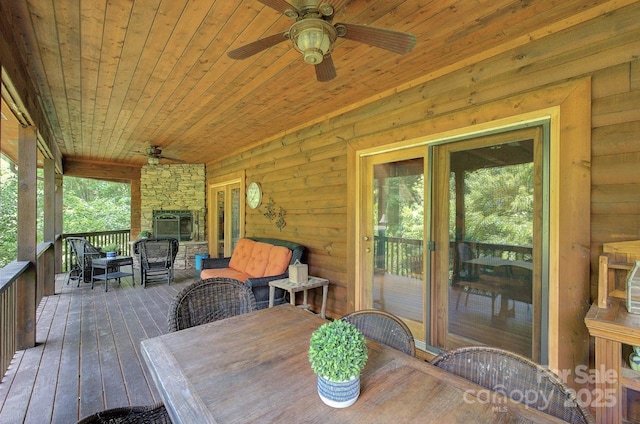 178 Anglers Way, Lake Lure, NC 28746 - dining space with a ceiling fan, wooden ceiling, hardwood / wood-style floors, plenty of natural light, and wood walls