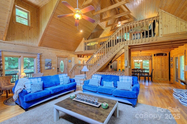 178 Anglers Way, Lake Lure, NC 28746 - living room with high vaulted ceiling, wood ceiling, wooden walls, healthy amount of natural light, and ceiling fan