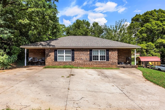 508 Gantt St Unit 1-2, Kings Mountain, NC 28086 - view of front of house featuring brick siding, roof with shingles, and view of wooded area