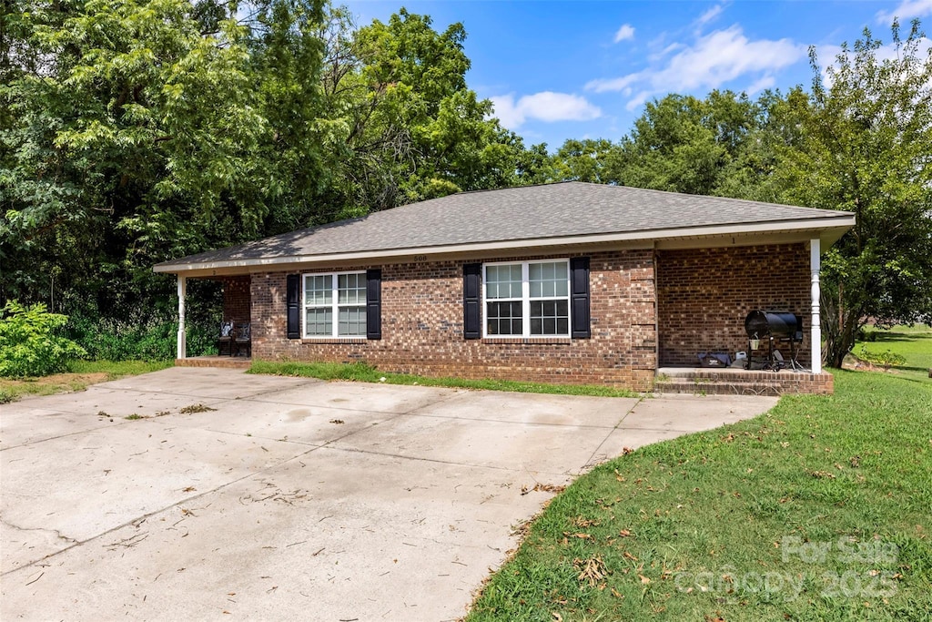 508 Gantt St Unit 1-2, Kings Mountain, NC 28086 - view of front of house with brick siding and a front lawn