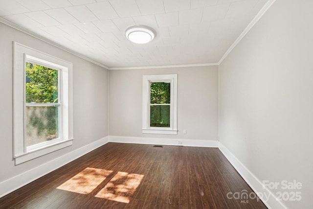 911 Elm St, Kannapolis, NC 28081 - spare room with crown molding and dark wood finished floors