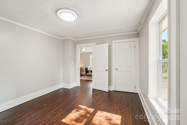 911 Elm St, Kannapolis, NC 28081 - unfurnished room with ornamental molding and dark wood-style flooring