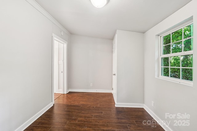 911 Elm St, Kannapolis, NC 28081 - unfurnished room with dark wood-type flooring and baseboards