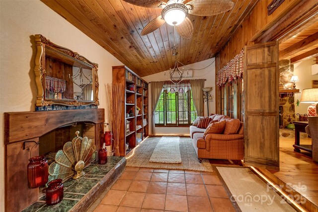 1504 Red Marble Rd, Andrews, NC 28901 - sitting room with a high end fireplace, vaulted ceiling, ceiling fan, tile patterned floors, and wooden ceiling