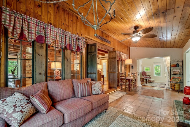 1504 Red Marble Rd, Andrews, NC 28901 - living room featuring wood walls, wood ceiling, ceiling fan, lofted ceiling, and tile patterned flooring