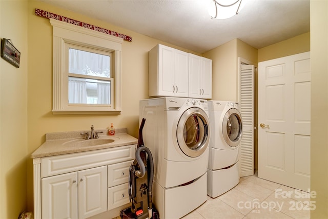 1504 Red Marble Rd, Andrews, NC 28901 - washroom featuring cabinet space, independent washer and dryer, and light tile patterned flooring